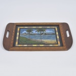 COLECIONISMO -Bandeja art deco de coleção confeccionada em vidro pintado decorado com "paisagem iconográfica do Rio de Janeiro", aplicações em asa de borboleta, estrutura em madeira marchetada. Marcas do tempo na madeira.Medida: 49 cm x 29 cm