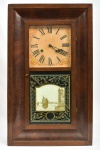 Relógio de parede semi carrilhão com caixa em madeira nobre e porta de vidro jateada com pintura de navio, mostrador em metal pintado, acompanha chave e pêndulo. Medida: 65,5 cm x 39 cm x 11 cm