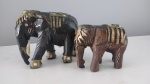 Par de elefantes decorativos confeccionado em material sintético - Medidas: 11x5x9 cm e 7x4x6cm