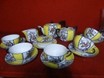 Lindo e antigo conjunto de chá em porcelana Noritak amarela com florais composto de 1 Bule, 1 Leiteira, 1 açucareiro, 1 Manteigueira e 5 xícaras.