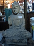 Escultura de Buda  em pedra com pequenos restauros a serem feitos. Altura: 65 cm Largura : 40 cm.