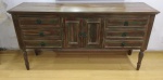 Buffet em madeira nobre patinada, com duas portas e 6 gavetas, necessita restauro, veja foto anexa, altura 95 x 53 x 186 cm.