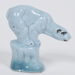 Urso azul em louça altura, 7 cm.