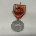 Militaria - Medalha em alumínio da Cruz Vermelha Japonesa (Japão).