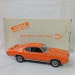 1969 Pontiac GTO Judge - Miniatura diecast extremamente detalhada fabricada pela afamada Danbury Mint. Até o peso dessa mini é diferenciado. Escala 1/24. Caixa original.