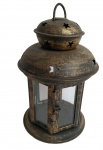 Lanterna indiana e metal vazado e com vidros nas laterais. Medida 20 cm de altura.
