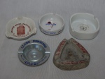 Cinco cinzeiros de coleção em diferentes materiais: Grande Hotel Presidente, Clube Biquense, Distribuidora Nova União, Harry's Bar e Dolder Grand Hotel. Maior diâm. 11cm.