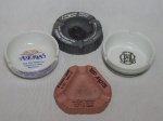 Quatro cinzeiro de coleção em diferentes materiais: Sigma, Top Motel, Mansão Asturias e um aplicado com monograma. Maior diâm. 10cm.