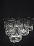 Seis copos para whisky em demi-cristal lapidado no padrão dedão e decorado com as iniciais "TR". Alts. 9cm.