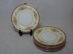 NORITAKE - Seis pratos para sobremesa em porcelana japonesa, borda com esmaltagem bege, medalhões de buquê de flores circundado por volutas e acantos interligados por guirlandas, friso grená. Marcado no fundo. Diam. 19,5cm.