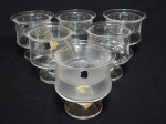 Seis taças para coquetel de camarão em cristal translúcido. Selo da manufatura Hering. Alt. 11cm.