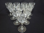 Dez taças em demi-cristal translúcido, pés em bolacha, lapidação dedão, haste facetada. Alt. 16cm.