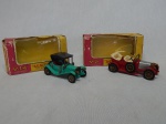 Duas réplicas "matchbox" de automóveis antigos: 1911 Maxwell Roadster e 1914 Prince Henry Vauxhall, lançadas pela manufatura Lesney, numerações Y-14  Y-2. Acondicionados em embalagem original. Comps. 8cm.