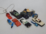 Oito miniaturas de veículos diversos, metal e plástico esmaltados, entre Harley Davison, batmóvel remoto e carros de polícia. Comp. maior 17cm.