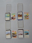 Quatro baralhos Super Trunfo antigos: "Campeões de Fórmula 1", "Carros Esporte", "GT Gran-Torino" e "Navios de Guerra". Todos sem garantia da totalidade das peças.