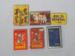 Seis jogos de baralho diversos: 2 "Pato Donald Sabido", "Jogo do Mico Preto", "Jogo da Memória Super Nescau", "Quebra-cabeça das Bichinhos" e baralho da Xerox. Sem garantia da totalidade das peças.