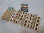 Duas peças: a) Antiga película super 8 alemã "Zugspitze 2964m", lançada pela Huber Colorfilm. Sem garantias de integridade. b) Álbum "Holiday in Italy" com 60 slides coloridos com paisagens italianas. Incompleto.
