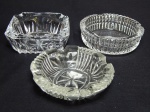 Três cinzeiros em vidro e cristal translúcido, lapidados de formas distintas. Maior 4 x 11cm.