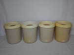 Quatro champagneiras em plástico rígido, confeccionadas pela Petrobrás como souvenir. 19 x 15cm.