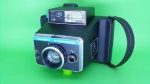 Antiga e revolucionaria maquina fotográfica Polaroid, Keystone funcionando e na caixa, ver fotos.