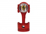 Relógio Quartz em forma de pistão automobilístico, 20 cm de comprimento, vide fotos. Cor vermelho da Ferrari.