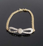 LINDA PULSEIRA EM OURO 18K AMARELO E BRANCO COM CRAVAÇÃO DE DIAMANTES. 18 CM DE COMPRIMENTO. 7,5 G