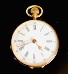 REMONTOIR  BELO RELÓGIO DE ALGIBEIRA EM OURO 14 K. MOSTRADOR ESMALTADO. FUNCIONANDO. 28 MM. 19,7 G (PESO TOTAL)