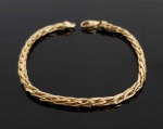 PULSEIRA EM TORCEIL EM OURO 18K. 19 CM DE COMPRIMENTO. 9,1 G