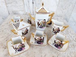 Serviço para café em porcelana esmaltada e vitrificada da marca Condessa/Blumenau  integrando Bule para café , açucareiro , cremeira e seis xícaras com pires . Todas as peças com design interessante e apresentando  figuras orientais e alces  em rica policromia sob fundo branco . Pegas e frisos em ouro.