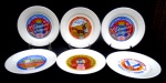 Seis pratos em faiança da marca TROPIC- ART para serviços de queijos diversos. TODOS COM DESENHOS DE QUEIJOS FRANCESES ( cinco diferentes  e apenas um repetido ) Diâmetro 18,5 cm.