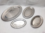 Lote de 4 travessas ovais em aço inox Meridional 18/10. Medindo a maior 45,5cm x 29cm.