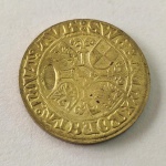 39. Reprodução banhada a Ouro de antiga moeda da Suíça. Esta peça se trata de uma réplica