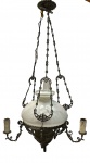 Imponente lampião dos anos 60, em metal com 3 velas, cúpula em vidro opalinada branca e manga translúcida, medindo: 1,00 m alt. x 60 cm diâmetro. (pequenos bicados).