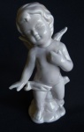 Singelo anjo em porcelana trabalhada. Medida 15 cm de altura.