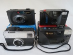 Quatro (04) câmeras fotográficas 35 mm sendo; A) Kodak Instamatic 133 , B) Fuji Dl 8, C) Sonaki k 148, na embalagem original e D) Kinon 321 na embalagem original. Todas em bom estado porém não testada, vendida no estado.