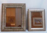Dois (2) porta retratos em madeira entalhada, decorado com pátina prateado. Med. 35 x 30cm, 28 x 22 cm.