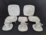 Jogo  8 Peças em Porcelana Branca sendo 2 Pratos Rasos, 2 fundos , 1 sobremesa e 3 Xicaras. Medidas Rasos 26 cm x 26 cm , fundos 23 cm x 23 cm , sobremesa 20 cm x 20 cm , xicaras 9 cm altura x 7,5 cm diametro e Pires 15 cm x 15 cm.