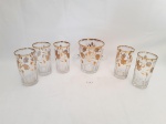 Jogo Balde de Gelo e 5 copos Longos Vidro Decorado Flores em Ouro . Medida: Balde 11,5 cm diametro x 14 cm altura apresenta pequeno bicado borda e Copo 7 cm diametro x 13,5 cm altura
