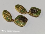 Antiga abotoadura em ouro  baixo com aplicação de esmalte representando cervo . Peso : 8,83 g