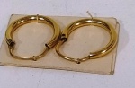 Par de brincos em banho de Ouro - mede: 1,5 cm