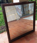 Espelho em Jacarandá ricamente trabalhado  -com vidro bisotado . Mede: 88x88 cm
