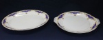 PORCELANA INGLESA - Parte de jogo de jantar em porcelana inglesa em tom marfim, rica douração e detalhes em azul. Composto de: 3 peças. Med. maior 7x26 cm e menor 36x30 cm.