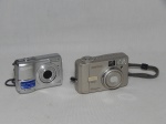 Duas câmeras digitais sendo uma PENTAX 330GS e uma OLIMPUS X-760. Ambas não testadas e sem garantias. Maior 10 x 4 x 6cm.