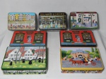 Sete latas colecionáveis em diversas decorações, algumas com desgastes. Maior 24 x 18 x 5cm, Menor 21 x 13 x 8cm.