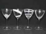 Quatro taças em demi cristal translúcido  em design moderno aplicadas com overlay branco leitoso. Etiqueta da loja LSA International. Alt. 20cm