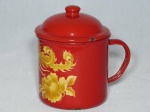 Caneca leiteira em Agatha esmaltada em vermelho decorada com pássaro e flor. Manufatura chinesa. Apresenta perdas na esmaltagem. 15 x 14cm