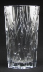 Vaso em cristal translúcido, na forma de naveta, decorado com lapidações de sulcos e olivas. Alt. 35 cm.