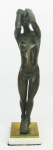 Escultura em bronze patinado "Oxana". Base em mármore e metal dourado. Alt. 39 cm.