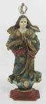 Nossa Senhora da Conceição - Imagem do sec. XIX, em madeira policromada. Coroa em metal. Alt. total 34 cm.
