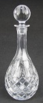 Licoreiro em cristal com lapidações dedão tijolinho e sulcos. Alt. 33 cm.